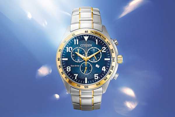 A Citizen Eco-drive men's Chronograph watch with a blue dial against on a light blue background.
